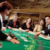 People playing Baccarat in casino
