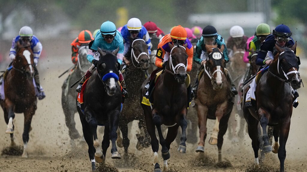 Horses racing at the Kentucky Derby