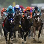 Horses racing at the Kentucky Derby