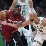 Miami Heat center Bam Adebayo battling against the Celtics