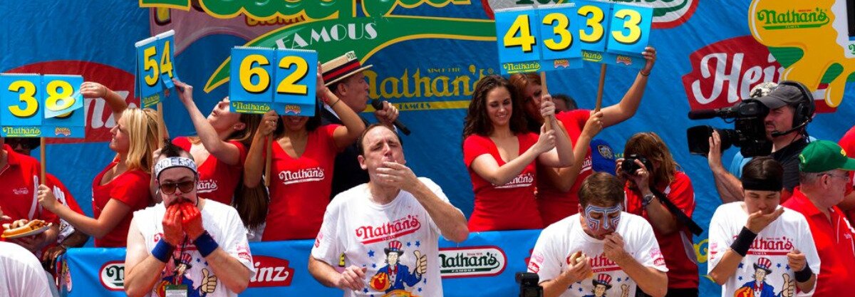 Joey Chestnut competing at the Nathan's Hot Dog Eating Contest