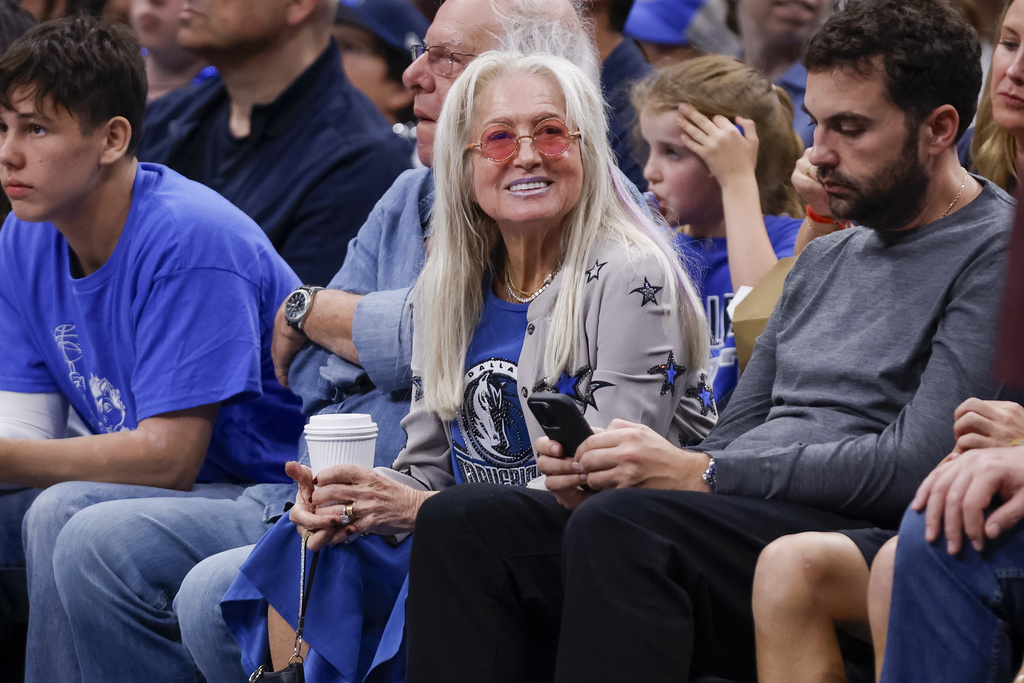 Miriam Adelson sitting courtside at a Dallas Mavericks game