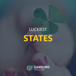 Luckiest States text centered, hand holding 4 leaf clover in background