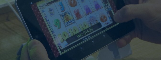 image of someone playing a casino game on their mobile device